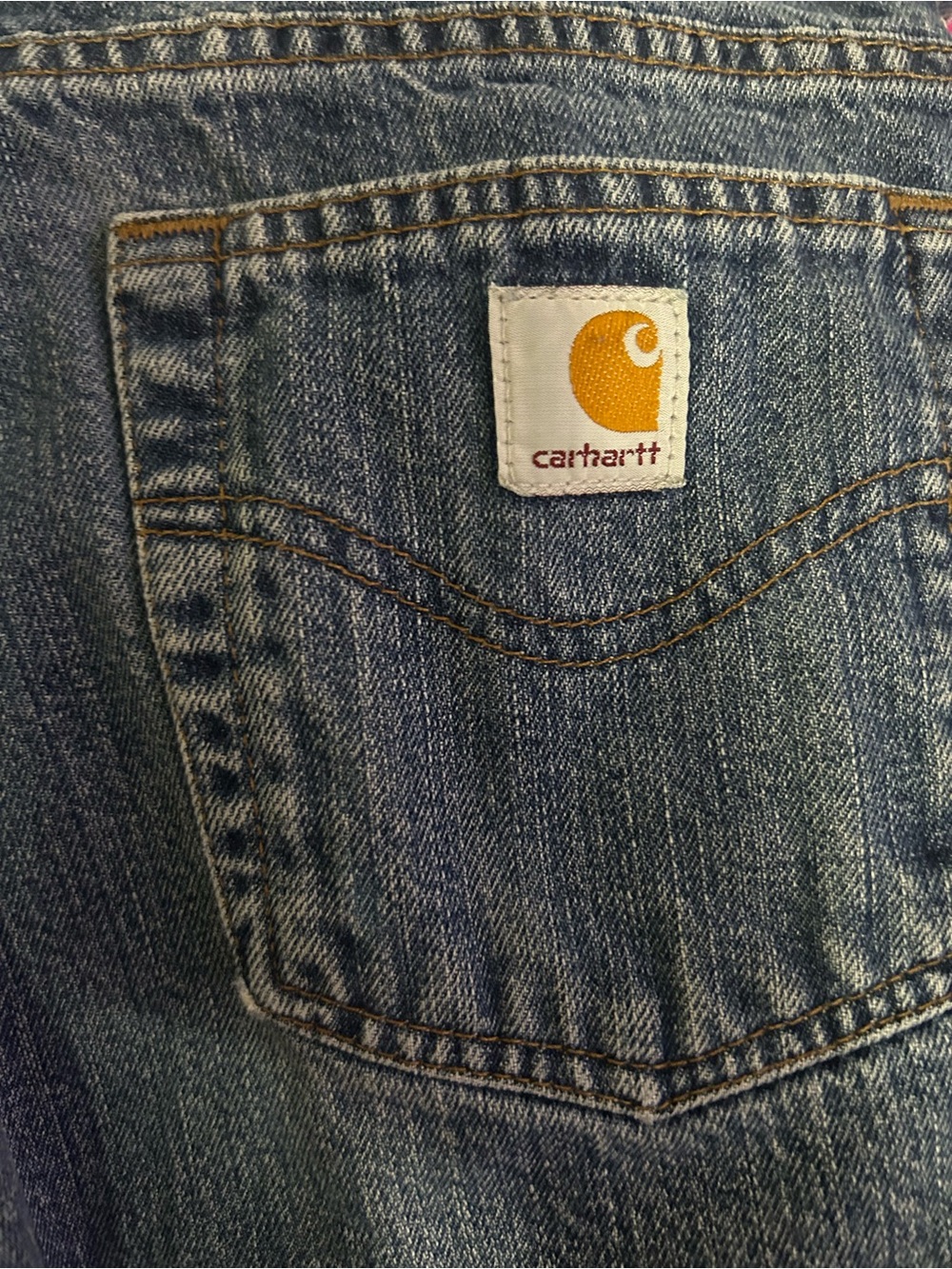 Carhartt Blue Denim Jeans with Gold Logo Patch